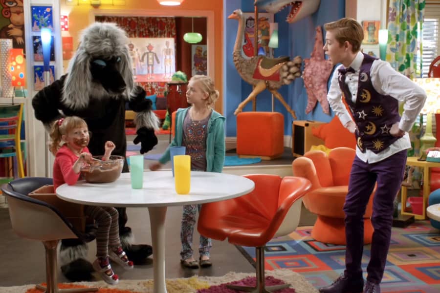 Yo Zappa Do talking with two girls and a man in a dog suit