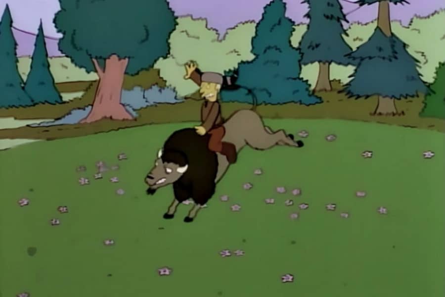 Jebediah riding a bucking buffalo