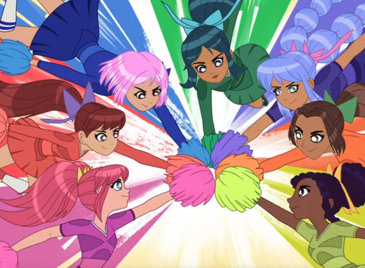 The Yuko cheerleaders joining their pom pom forces togther